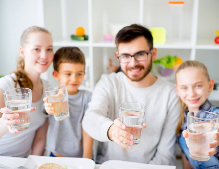 Family Drinking Water